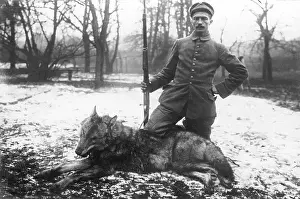 Hunted: German soldier with a shot wolf, 1916