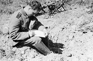 Writes: A German soldier writes a message, 1940