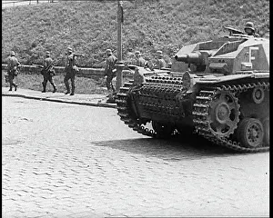 Meuse: German Soldiers Advancing, Accompanied By A