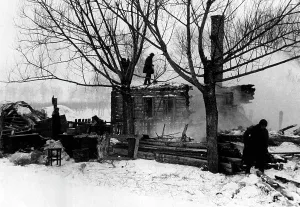 Countless: German soldiers in front of a destroyed wooden