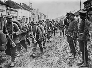 Pickelhelm: German soldiers marching through the Serbian town
