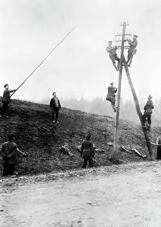 Construct: German soldiers re-construct a telegraph line, 1914