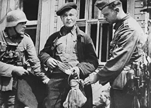 Believed: German soldiers during searching suspected partisans