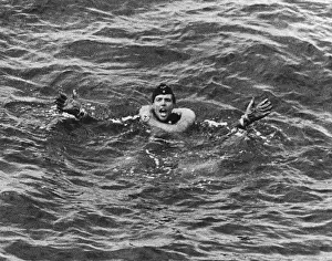 Submariner: German submariner from U-175 has a life ring around