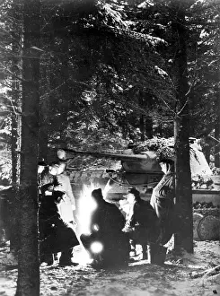 Campfire: German tank crew at a campfire in the Ardennes, 1945