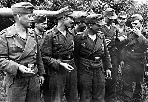 Conferred: German tank crews after a battle, 1944
