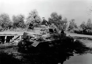 Crosses: German tank crosses a river, 1942