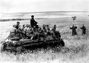 Correspondent: German tank with Soviet prisoners of war, 1942