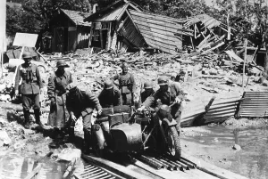 Kradschutzen: German troops crossing a river, 1940