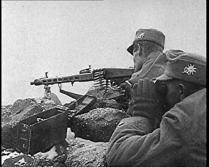 Manning: German Troops Manning a Machine Gun in the