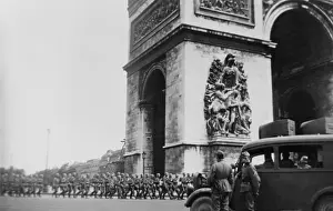 Relatively: German troops marching around Arc de Triomphe