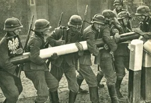Barrier: German troops remove the border barrier between