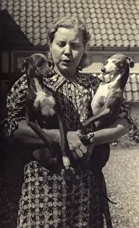 Flowery: German woman and two dogs