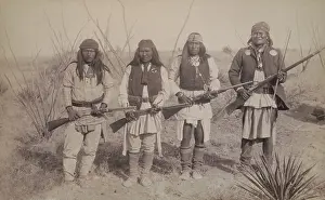 Boos: Geronimo, standing on the right, holding a