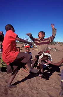 Bushman: Ghansi, BOTSWANA. San children dancing. @ Paul Weinberg