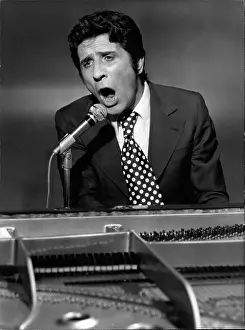 Becaud: Gilbert Becaud, French singer, in a recording studio