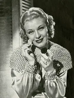 Endorsement: Ginger Rogers, applying Max Factor make up