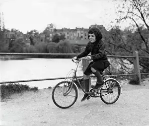 The John Krish Collection: Girl on a bicycle in a park