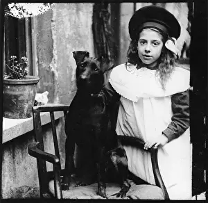 Flowerpot: Girl with black dog
