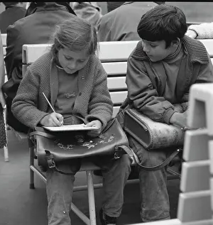 Satchels: Girl and boy with their school satchels