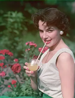 Sips: GIRL WITH BRITVIC GLASS