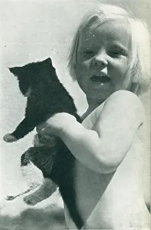 Clutched: Girl With A Cat