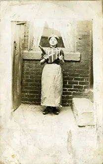 Shuttle: Mill Girl with Cotton Shuttle
