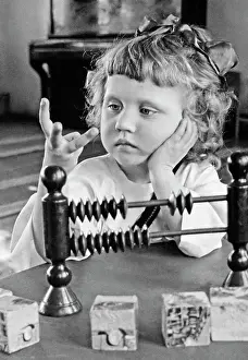Rabinovich: Girl with counting frame, 1952