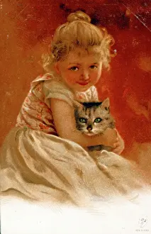 Cuddling: Girl cuddling her cat