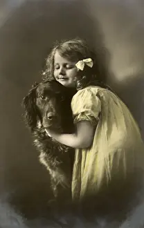 Cuddling: Girl Cuddling Dog