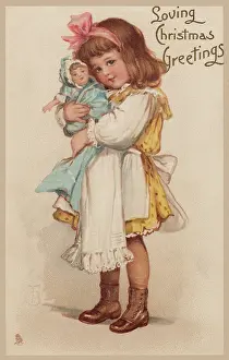 Cuddles: Girl cuddling her dolly