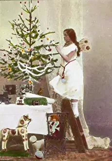 Hangings: Girl decorating the christmas tree