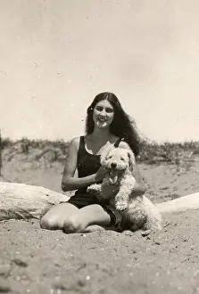 Vanessa Wagstaff: Girl and dog on a beach