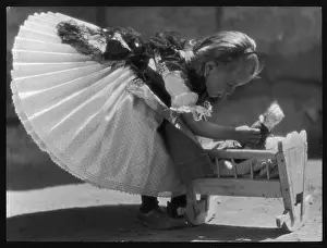 Crafted: GIRL AND DOLL IN CRIB