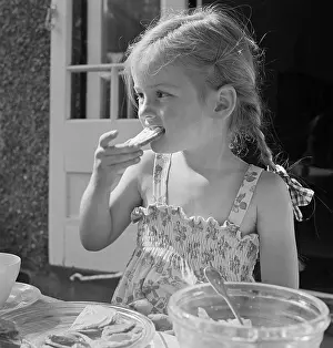 Snacking: Girl eating