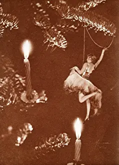 Photomontage: Girl hanging on a Christmas tree