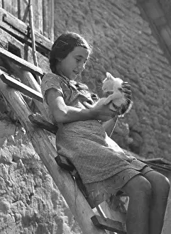 Doting: GIRL WITH KITTEN 1930S