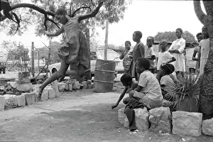 Bophuthatswana: Girl leaping over string, a game in Oukasie. The people