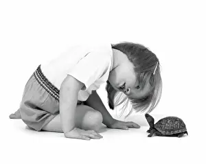 Frt001: Girl looking at box turtle