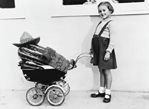 Marrow: GIRL WITH MARROW IN PRAM
