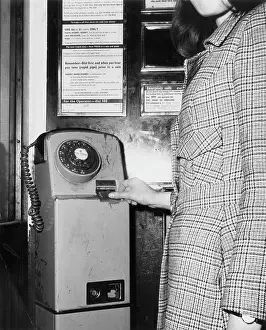 Vandalised: GIRL IN PHONE BOX