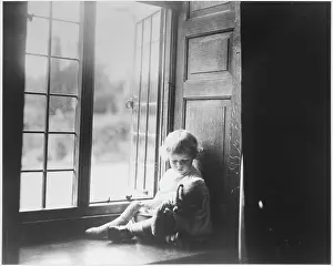 The Childrens Society: GIRL PLAYS WITH DOLL
