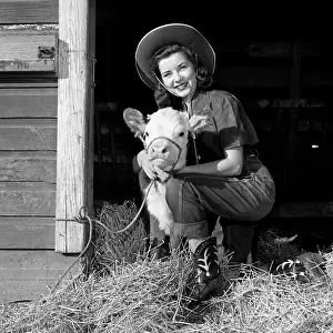 Tay001: Girl Posing With Calf In Straw