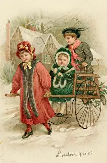 Handcart: Girl pulls children's handcart through the snow