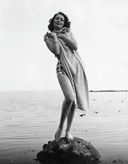 Recreates: GIRL ON ROCK 1950S