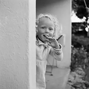 Cheekily: Girl sucking finger