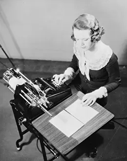 Adding: Girl using adding machine