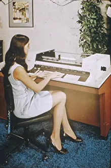 Cumbersome: GIRL USING COMPUTER 1974