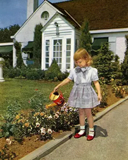Driveway: Girl Watering Flowers