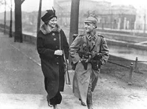 Accompanies: A girlfriend accompanies a soldier to the barracks, 1914